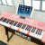美科（MEIKERGR）MK-2117知能電子キー大人61ピアノ鍵盤子供初学多機能教育専門ピンク電子ピアノ知能版+大祝儀+Z型琴架+琴包